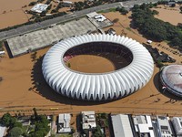 Foto Udara Banjir Bak Laut di Paru-Paru Bumi, Stadion Bola Jadi Kolam
