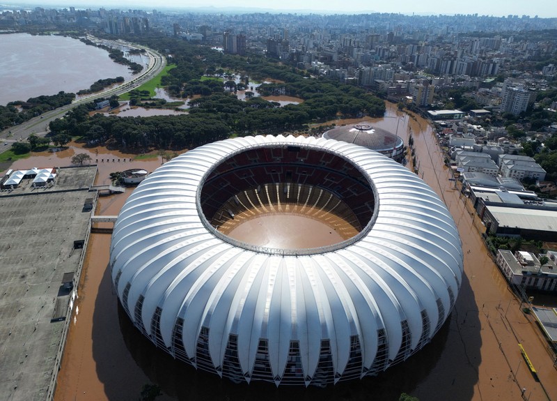 Foto udara menampilkan kondisi Stadion Beira Rio yang terendam banjir di Porto Alegre, Rio Grande do Sul, Brasil, Selasa (7/5/2024). (AP Photo/Carlos Macedo) Foto udara menampilkan kondisi Stadion Beira Rio yang terendam banjir di Porto Alegre, Rio Grande do Sul, Brasil, Selasa (7/5/2024). (AP Photo/Carlos Macedo)
