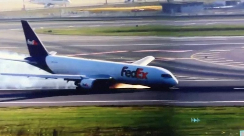 This aerial photo show the burn-out Japan Airlines plane at Haneda airport on Wednesday, Jan. 3, 2024, in Tokyo, Japan. The large passenger plane and a Japanese coast guard aircraft collided on the runway at Tokyo's Haneda Airport on Tuesday and burst into flames, killing several people aboard the coast guard plane, officials said. (Kyodo News via AP)
