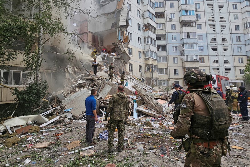 Russia Ukraine In this photo taken from video released by the Russian Emergency Ministry Press Service on Sunday, May 12, 2024, Russian emergency services work at the scene of a partially collapsed block of flats authorities said was hit during an attack by Ukrainian shelling, in Belgorod, Russia. (Russian Emergency Ministry Press Service via AP)