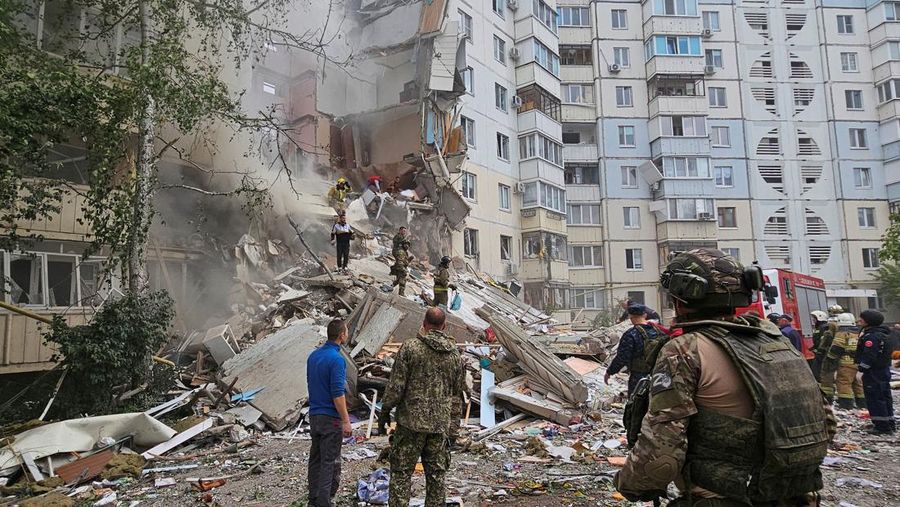In this photo taken from video released by the Russian Emergency Ministry Press Service on Sunday, May 12, 2024, Russian emergency services work at the scene of a partially collapsed block of flats authorities said was hit during an attack by Ukrainian shelling, in Belgorod, Russia. (Russian Emergency Ministry Press Service via AP)