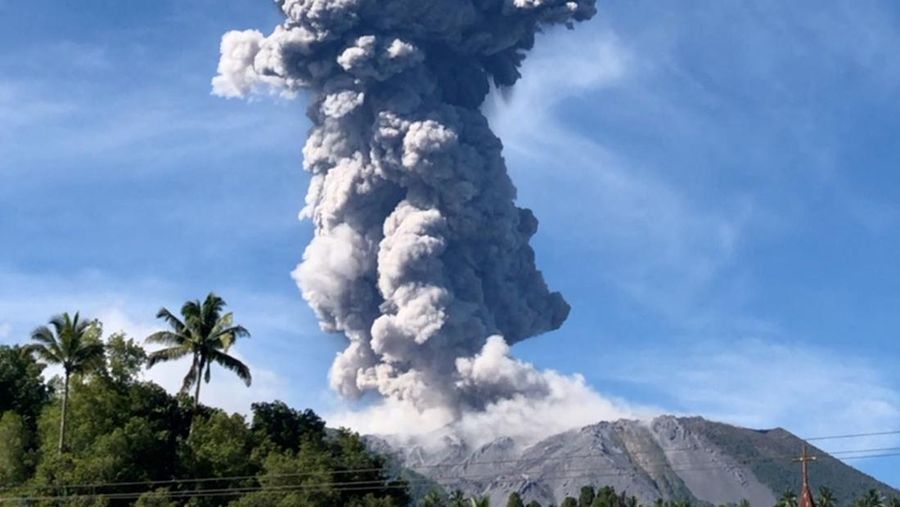 A column of ash rises over the Gunung Ibu (Mount Ibu) volcano, in Tabaru, North Maluku province, Indonesia May 13, 2024 in this screen grab obtained from social media video. Fhe Booroto/via REUTERS  THIS IMAGE HAS BEEN SUPPLIED BY A THIRD PARTY. MANDATORY CREDIT. NO RESALES. NO ARCHIVES.