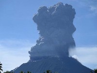 This handout photo taken and released by the Center for Volcanology and Geological Hazard Mitigation (PVMBG) on May 13, 2024 shows Mount Ibu spewing thick smoke in Indonesia's North Maluku Province. A volcano in eastern Indonesia erupted on May 13, s