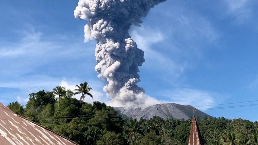 A column of ash rises over the Gunung Ibu (Mount Ibu) volcano, in Tabaru, North Maluku province, Indonesia May 13, 2024 in this screen grab obtained from social media video. Fhe Booroto/via REUTERS  THIS IMAGE HAS BEEN SUPPLIED BY A THIRD PARTY. MANDATORY CREDIT. NO RESALES. NO ARCHIVES.