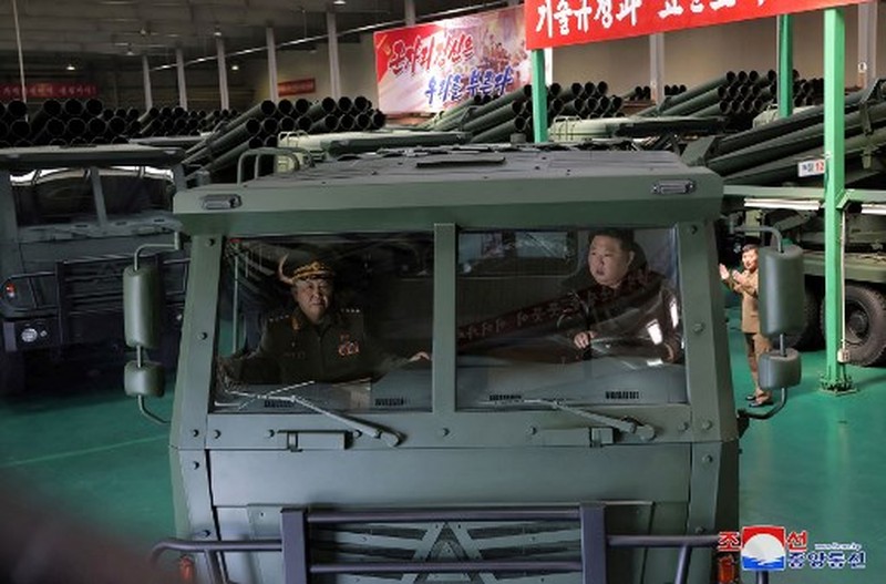 NKOREA-DEFENCE-MILITARY This recent undated picture released by North Korea's official Korean Central News Agency (KCNA) via KNS on May 13, 2024 shows North Korea's leader Kim Jong Un (C) inspecting carriers with a 240mm multiple rocket launcher system while visiting a national defence industrial enterprise at an undisclosed location in North Korea. (Photo by KCNA VIA KNS / AFP) / South Korea OUT / REPUBLIC OF KOREA OUT
---EDITORS NOTE--- RESTRICTED TO EDITORIAL USE - MANDATORY CREDIT