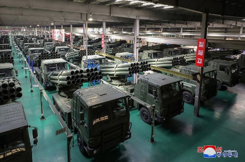 NKOREA-DEFENCE-MILITARY This recent undated picture released by North Korea's official Korean Central News Agency (KCNA) via KNS on May 13, 2024 shows North Korea's leader Kim Jong Un (C) inspecting carriers with a 240mm multiple rocket launcher system while visiting a national defence industrial enterprise at an undisclosed location in North Korea. (Photo by KCNA VIA KNS / AFP) / South Korea OUT / REPUBLIC OF KOREA OUT
---EDITORS NOTE--- RESTRICTED TO EDITORIAL USE - MANDATORY CREDIT