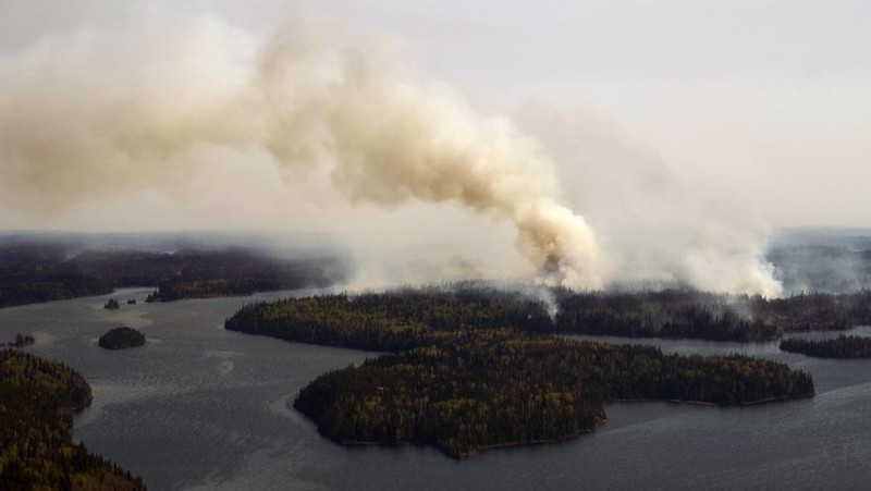 FILE PHOTO: Smoke rises from mutual aid wildfire GCU007 in the Grande Prairie Forest Area near TeePee Creek, Alberta, Canada May 10, 2024. Alberta Wildfire/Handout via REUTERS/File Photo