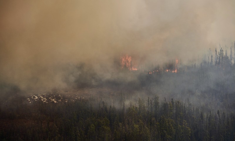 CANADA-WILDFIRE/EXPLAINER FILE PHOTO: Smoke rises from mutual aid wildfire GCU007 in the Grande Prairie Forest Area near TeePee Creek, Alberta, Canada May 10, 2024. Alberta Wildfire/Handout via REUTERS/File Photo