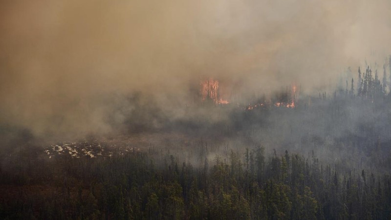 FILE PHOTO: Smoke rises from mutual aid wildfire GCU007 in the Grande Prairie Forest Area near TeePee Creek, Alberta, Canada May 10, 2024. Alberta Wildfire/Handout via REUTERS/File Photo