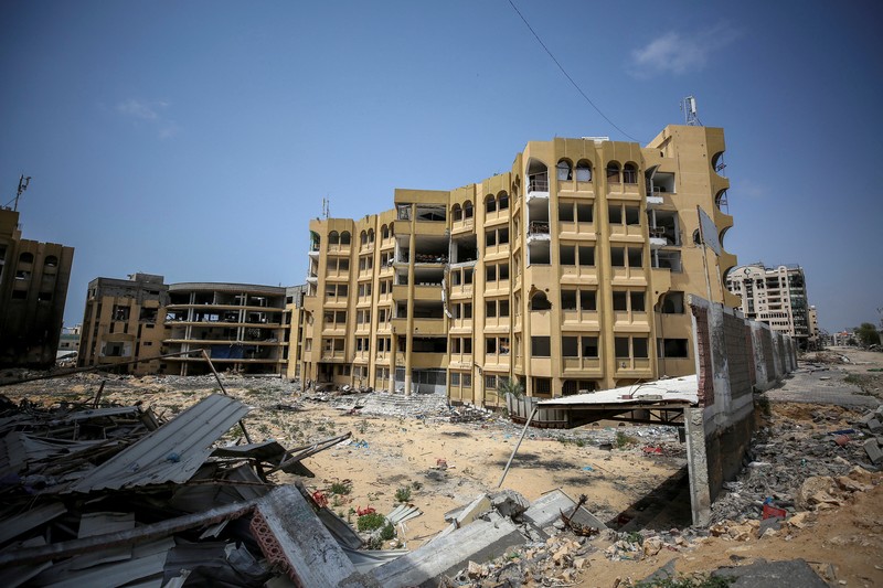 ISRAEL-PALESTINIANS/GAZA-EDUCATION FILE PHOTO: Smoke billows following Israeli strikes on the Islamic University of Gaza (IUG), amid the ongoing conflict between Israel and Hamas, in Gaza City, October 11, 2023. REUTERS/Saleh Salem/File Photo
