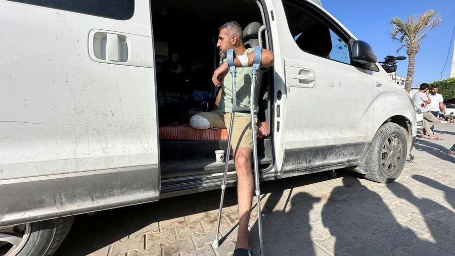 Palestinian Journalist Sami Shehada, whose leg was amputated following his injury while covering events of Israel's military offensive in Nuseirat in April 2024, resumes covering events for Turkish state broadcaster TRT, amid the ongoing conflict between Israel and the Palestinian Islamist group Hamas, in Deir Al-Balah in central Gaza Strip May 13, 2024. REUTERS/Doaa Rouqa