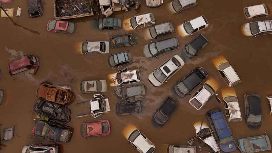 A drone view shows cars under water at a courtyard of the State Traffic Department during floods in Eldorado do Sul, Rio Grande do Sul state, Brazil, May 13, 2024. REUTERS/Amanda Perobelli