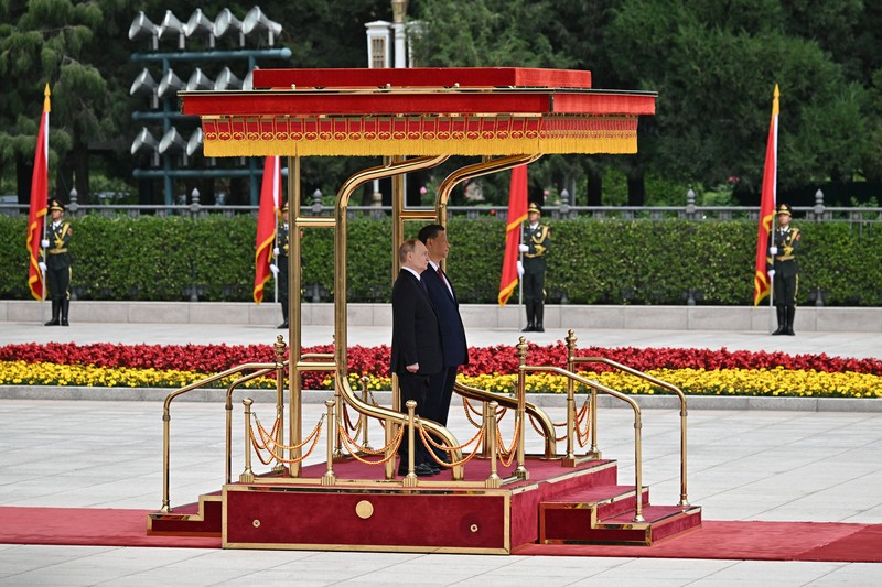 Russian President Vladimir Putin and Chinese President Xi Jinping attend an official welcoming ceremony in Beijing, China May 16, 2024. Sputnik/Sergei Bobylev/Pool via REUTERS ATTENTION EDITORS - THIS IMAGE WAS PROVIDED BY A THIRD PARTY.
