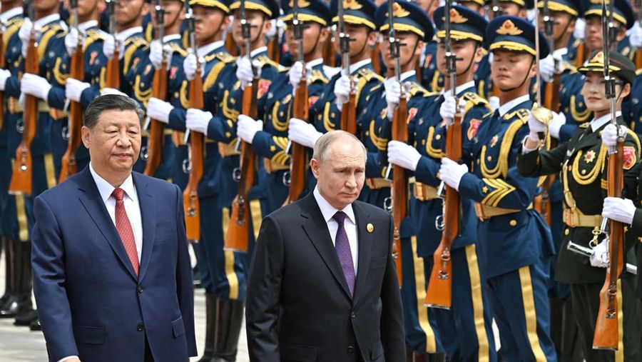 Russian President Vladimir Putin and Chinese President Xi Jinping attend an official welcoming ceremony in Beijing, China May 16, 2024. Sputnik/Sergei Bobylev/Pool via REUTERS ATTENTION EDITORS - THIS IMAGE WAS PROVIDED BY A THIRD PARTY.