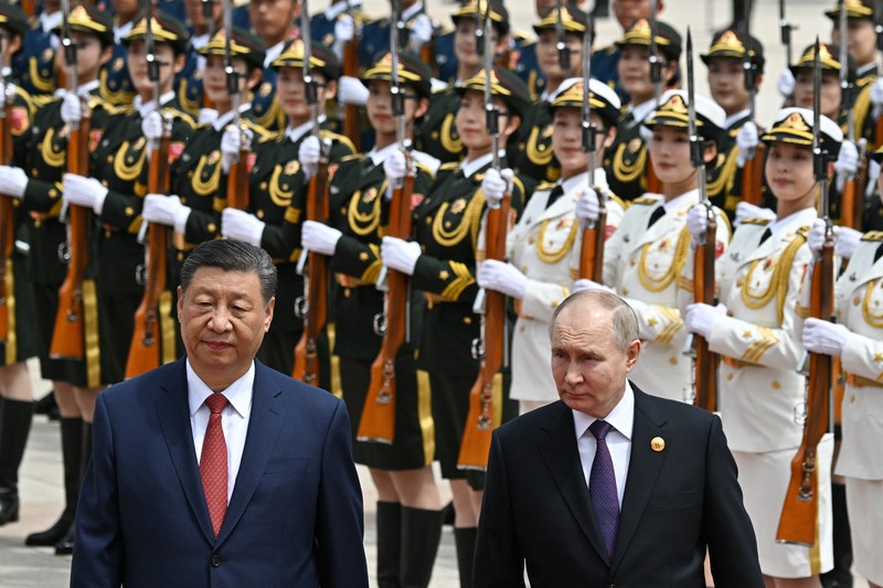 Russian President Vladimir Putin and Chinese President Xi Jinping attend an official welcoming ceremony in Beijing, China May 16, 2024. Sputnik/Sergei Bobylev/Pool via REUTERS ATTENTION EDITORS - THIS IMAGE WAS PROVIDED BY A THIRD PARTY.