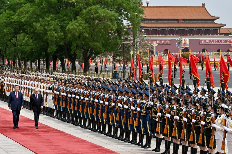 Russian President Vladimir Putin and Chinese President Xi Jinping attend an official welcoming ceremony in Beijing, China May 16, 2024. Sputnik/Sergei Bobylev/Pool via REUTERS ATTENTION EDITORS - THIS IMAGE WAS PROVIDED BY A THIRD PARTY.