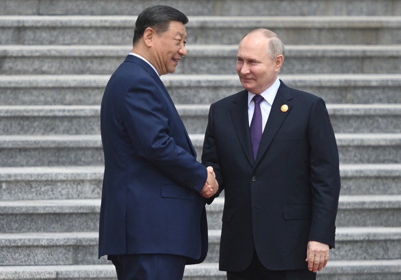Russian President Vladimir Putin and Chinese President Xi Jinping attend an official welcoming ceremony in Beijing, China May 16, 2024. Sputnik/Sergei Bobylev/Pool via REUTERS ATTENTION EDITORS - THIS IMAGE WAS PROVIDED BY A THIRD PARTY.