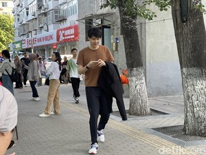 Tren Liburan Gen Z China, Pilih Gaya Militer Alias Ngirit