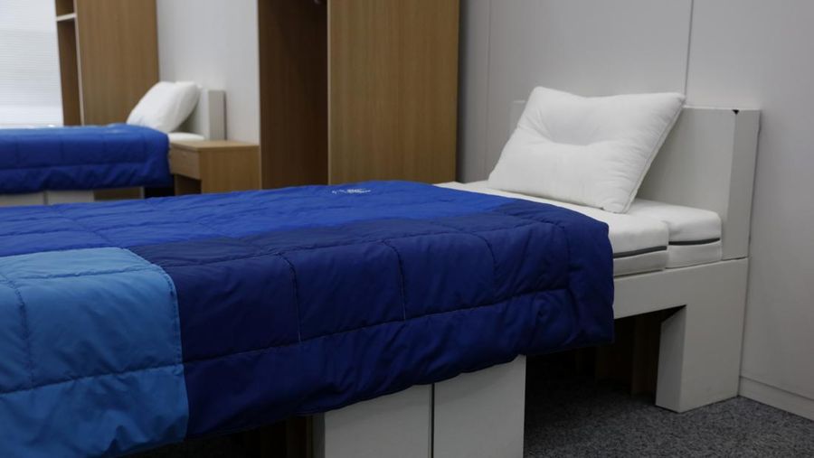 Two sets of bedroom furniture, including cardboard beds, for the Tokyo 2020 Olympic and Paralympic Villages are shown in a display room Thursday, Jan. 9, 2020, in Tokyo. Tokyo Olympic athletes beware - particularly larger ones. The single bed frames in the Athletes Village at this year's Olympics will be made of cardboard. The single bed frames will be recycled into paper products after the games. The mattress components - the mattress are not made of cardboard - will be recycled into plastic products.. (AP Photo/Jae C. Hong)
