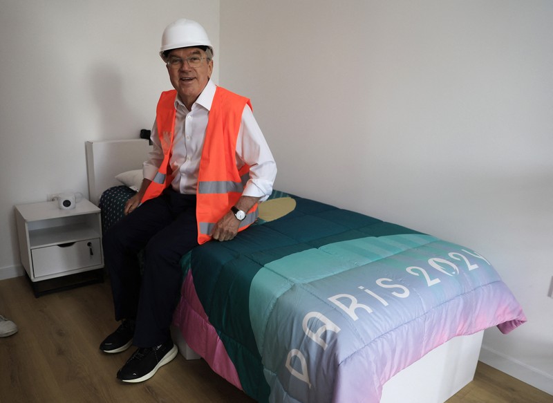 Paris 2024 Olympic Village International Olympic Committee (IOC) president Thomas Bach enters a room as he visits the Athletes' village in Saint-Ouen-sur-Seine, outside Paris, Tuesday, July 25, 2023. (Pascal Rossignol/Pool via AP)
