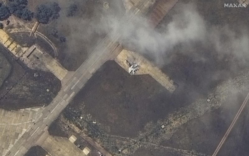 Russia Ukraine War This image released by Maxar Technologies shows an overview of destroyed MiG 31 fighter aircraft and fuel storage facility at Belbek air base, near Sevastopol, in Crimea, Thursday, May 16, 2024. (Satellite image ©2024 Maxar Technologies via AP)