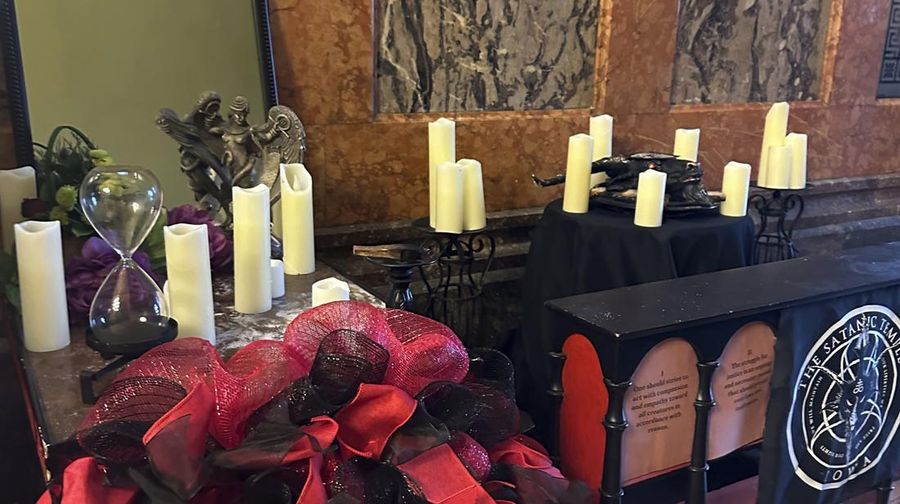 A damaged Satanic display is shown at the Iowa state Capitol on Friday, Dec. 15, 2023, in Des Moines, Iowa. The display, which has prompted outrage by some people who say it&rsquo;s inappropriate at any time but especially during the Christmas holidays, was damaged Thursday.    (AP Photo/Scott McFetridge)