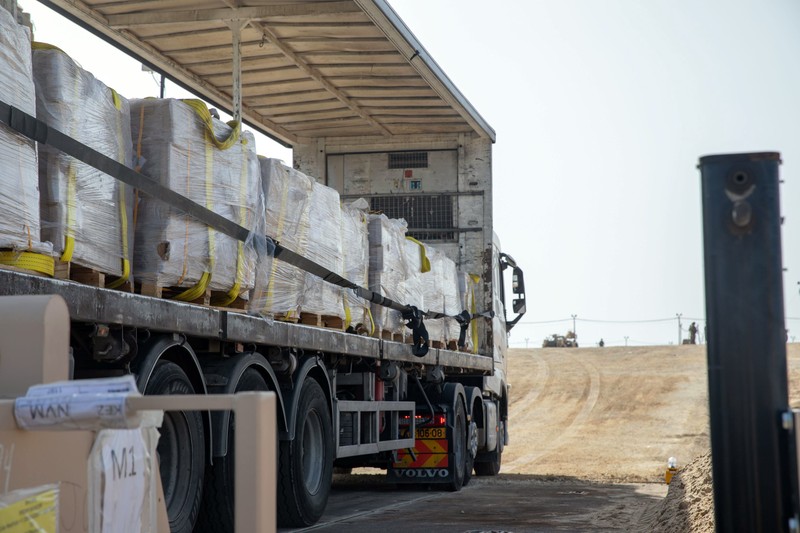 United States Gaza Aid The image provided by U.S, Central Command, shows U.S. Army soldiers assigned to the 7th Transportation Brigade (Expeditionary), U.S. Navy sailors assigned to Amphibious Construction Battalion 1, and Israel Defense Forces placing the Trident Pier on the coast of Gaza Strip on Thursday, May 16, 2024. The temporary pier is part of the Joint Logistics Over-the-Shore capability. The U.S. military finished installing the floating pier on Thursday, with officials poised to begin ferrying badly needed humanitarian aid into the enclave besieged over seven months of intense fighting in the Israel-Hamas war. (U.S. Central Command via AP)