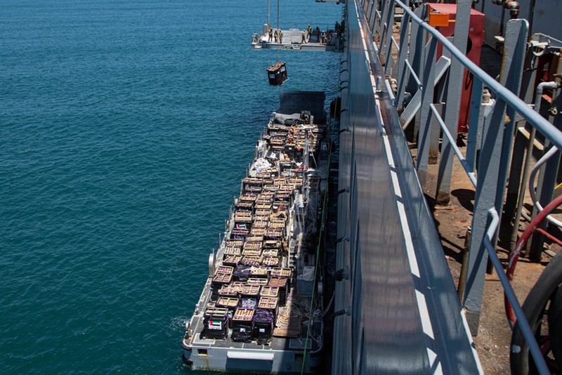 United States Gaza Aid The image provided by U.S, Central Command, shows U.S. Army soldiers assigned to the 7th Transportation Brigade (Expeditionary), U.S. Navy sailors assigned to Amphibious Construction Battalion 1, and Israel Defense Forces placing the Trident Pier on the coast of Gaza Strip on Thursday, May 16, 2024. The temporary pier is part of the Joint Logistics Over-the-Shore capability. The U.S. military finished installing the floating pier on Thursday, with officials poised to begin ferrying badly needed humanitarian aid into the enclave besieged over seven months of intense fighting in the Israel-Hamas war. (U.S. Central Command via AP)