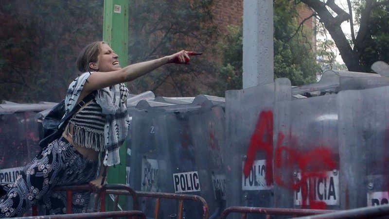 A protester waves a Palestinian flag during a demonstration in support of Palestinians, amid the ongoing conflict between Israel and the Palestinian Islamist group Hamas, in Mexico City, Mexico May 28, 2024. REUTERS/Henry Romero   REFILE - QUALITY REPEAT