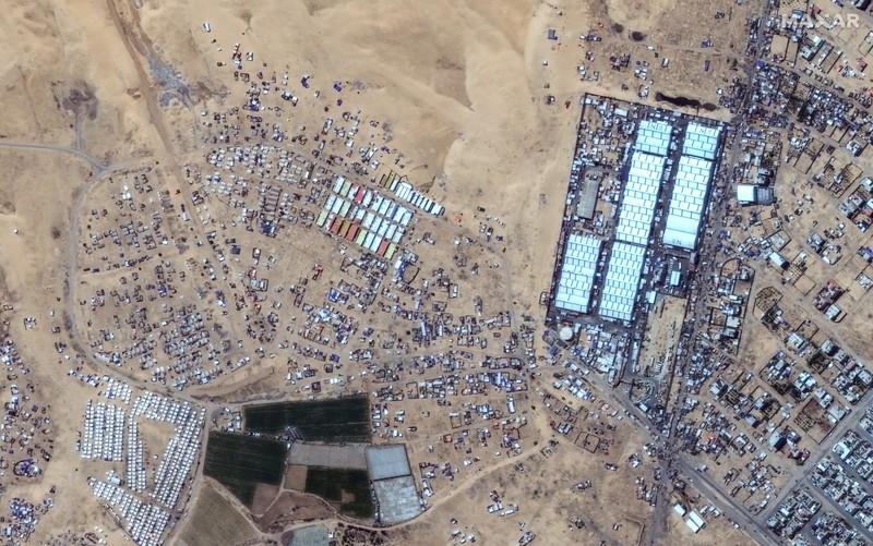 Gambar citra satelit yang dirilis pada Rabu (29/5) menunjukkan dampak serangan udara Israel di Rafah. (Maxar Technologies/Handout via REUTERS) Gambar citra satelit yang dirilis pada Rabu (29/5) menunjukkan dampak serangan udara Israel di Rafah. (Maxar Technologies/Handout via REUTERS)
