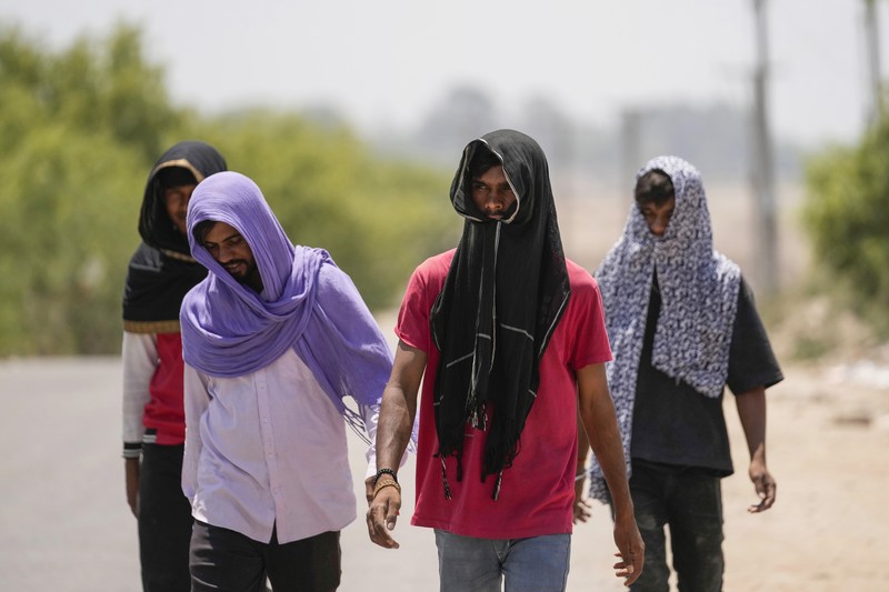 Ibu kota India, New Delhi, dilanda panas ekstrem dengan suhu mencapai rekor tertinggi 49,9 derajat Celsius pada Kamis (30/5). (AP Photo/Channi Anand) Ibu kota India, New Delhi, dilanda panas ekstrem dengan suhu mencapai rekor tertinggi 49,9 derajat Celsius pada Kamis (30/5). (AP Photo/Channi Anand)