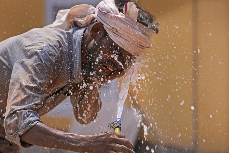 Ibu kota India, New Delhi, dilanda panas ekstrem dengan suhu mencapai rekor tertinggi 49,9 derajat Celsius pada Kamis (30/5). (AP Photo/Channi Anand) Ibu kota India, New Delhi, dilanda panas ekstrem dengan suhu mencapai rekor tertinggi 49,9 derajat Celsius pada Kamis (30/5). (AP Photo/Channi Anand)