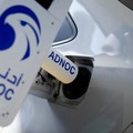 An Abu Dhabi National Oil Company's (ADNOC) robotic fueling arm fuels a car as part of a demonstration during a media tour in Abu Dhabi, United Arab Emirates, May 27, 2024. REUTERS/Nabila Eltigi NO RESALES. NO ARCHIVES