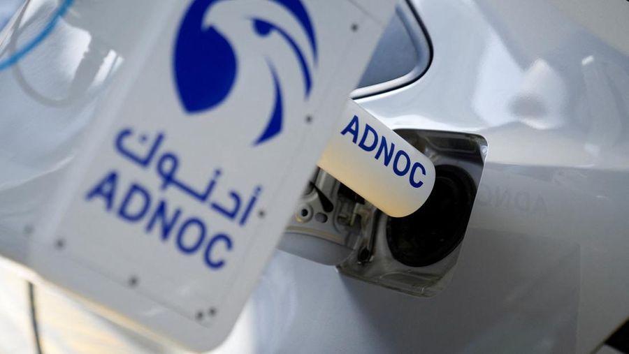 An Abu Dhabi National Oil Company's (ADNOC) robotic fueling arm fuels a car as part of a demonstration during a media tour in Abu Dhabi, United Arab Emirates, May 27, 2024. REUTERS/Nabila Eltigi NO RESALES. NO ARCHIVES