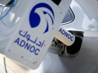 An Abu Dhabi National Oil Company's (ADNOC) robotic fueling arm fuels a car as part of a demonstration during a media tour in Abu Dhabi, United Arab Emirates, May 27, 2024. REUTERS/Nabila Eltigi NO RESALES. NO ARCHIVES