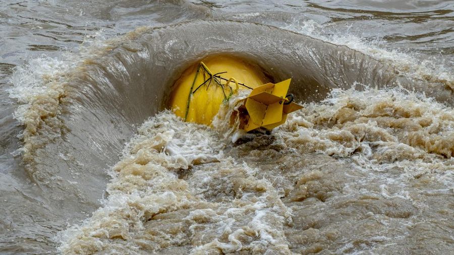 A car washed away by floodwater rests on a well, in Rudersberg, Germany, Monday, June 3, 2024. Persistent heavy rain led to widespread flooding in the southern states of Bavaria and Baden-Wuerttemberg over the weekend. (Bernd Wei'brod/dpa via AP)