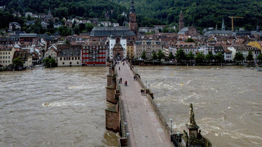 A gold selling shop is under water in a flooded street in the center of Passau in Bavaria, southern Germany, on June 4, 2024. Heavy rains from May 31, 2024 onwards have led to flooding across the southern German states of Baden-Wuerttemberg and Bavaria and that have claimed four lives so far. Thousands of people in these regions had to leave their homes. (Photo by Michaela STACHE / AFP)