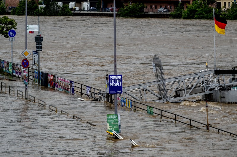 A car washed away by floodwater rests on a well, in Rudersberg, Germany, Monday, June 3, 2024. Persistent heavy rain led to widespread flooding in the southern states of Bavaria and Baden-Wuerttemberg over the weekend. (Bernd Wei'brod/dpa via AP)