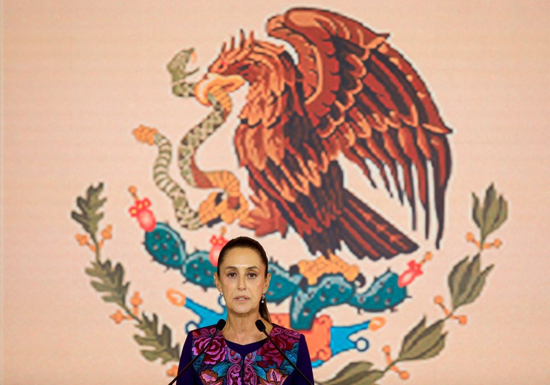 MEXICO-ELECTION/ Presidential candidate of the ruling Morena party Claudia Sheinbaum, reacts while addressing her supporters after winning the presidential election, at Zocalo Square in Mexico City, Mexico June 3, 2024. REUTERS/Alexandre Meneghini