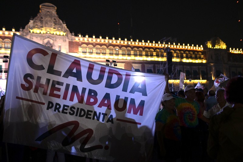 MEXICO-ELECTION/ Presidential candidate of the ruling Morena party Claudia Sheinbaum, reacts while addressing her supporters after winning the presidential election, at Zocalo Square in Mexico City, Mexico June 3, 2024. REUTERS/Alexandre Meneghini