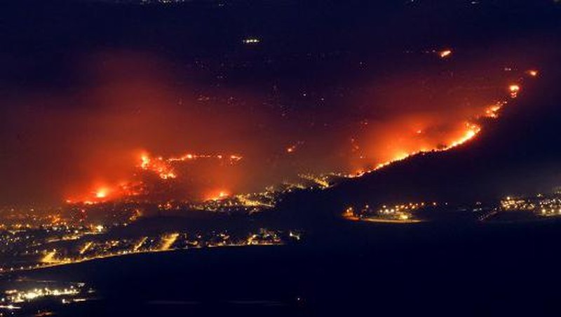 Smoke and fire covers the area following rocket attacks from Lebanon, amid ongoing cross-border hostilities between Hezbollah and Israeli forces, near Kiryat Shmona, Israel, close to its border with Lebanon, June 3, 2024. REUTERS/Ayal Margolin ISRAEL OUT. NO COMMERCIAL OR EDITORIAL SALES IN ISRAEL