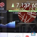 Layar digital pergerakan Indeks Harga Saham Gabungan (IHSG) terpantau hijau pada perdagangan sesi I Selasa (4/6/2024). (CNBC Indonesia/Tri Susilo)