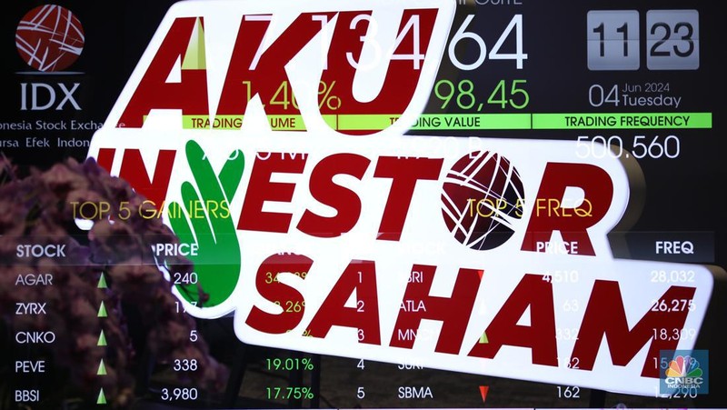 Layar digital pergerakan Indeks Harga Saham Gabungan (IHSG) terpantau hijau pada perdagangan sesi I Selasa (4/6/2024). (վ/Tri Susilo)