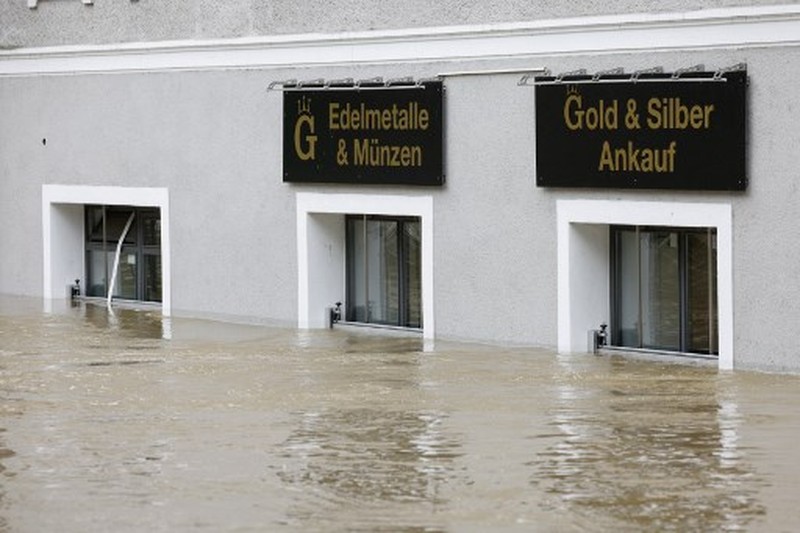 GERMANY-WEATHER-FLOODS A gold selling shop is under water in a flooded street in the center of Passau in Bavaria, southern Germany, on June 4, 2024. Heavy rains from May 31, 2024 onwards have led to flooding across the southern German states of Baden-Wuerttemberg and Bavaria and that have claimed four lives so far. Thousands of people in these regions had to leave their homes. (Photo by Michaela STACHE / AFP)