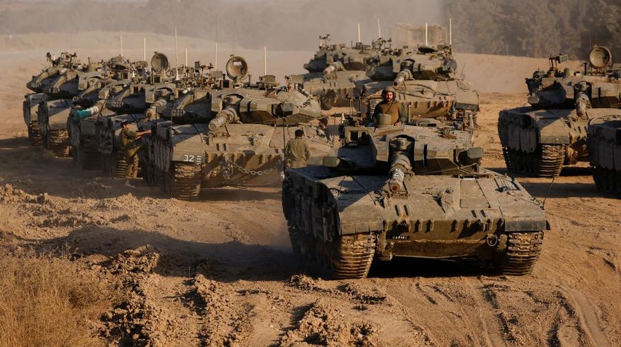 An Israeli soldier stands in a tank, amid the ongoing conflict between Israel and Hamas, near the Israel-Gaza border, in Israel, June 4, 2024. REUTERS/Amir Cohen     TPX IMAGES OF THE DAY