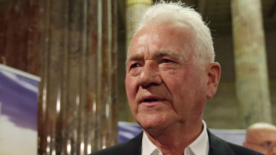 FILE -  Austro-Canadian billionaire Frank Stronach of his party Team Stronach arrives at the parliament for a TV discussion during national elections in Vienna, Austria, Sunday, Sept. 29, 2013. Canadian police have charged Stronach with sexual assault dating back to the 1980s.  Peel Regional police said in a statement that Stronach, 91, was arrested Friday, June 8, 2024, and charged with five crimes including, rape, indecent assault on a female, sexual assault and forcible confinement. (AP Photo/Matthias Schrader, File)