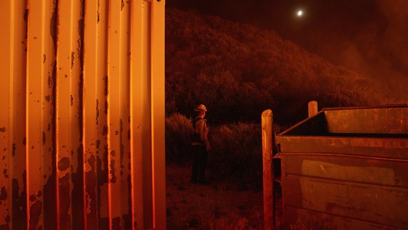 Firefighters work against the advancing Post Fire on Sunday, June 16, 2024, in Gorman, Calif. (AP Photo/Eric Thayer)