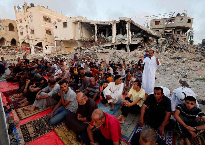 Palestinians pray on the first day of the Muslim holiday of Eid al-Adha on the Al-Aqsa compound, also known to Jews as the Temple Mount, in Jerusalem's Old City June 16, 2024. REUTERS/Ammar Awad