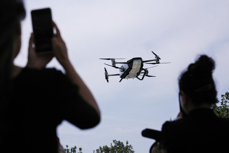 Mobil terbang listrik XPeng Voyager X2 karya XPeng AeroHT, dipamerkan di Beijing, China 18 Juni 2024. (REUTERS/Tingshu Wang)