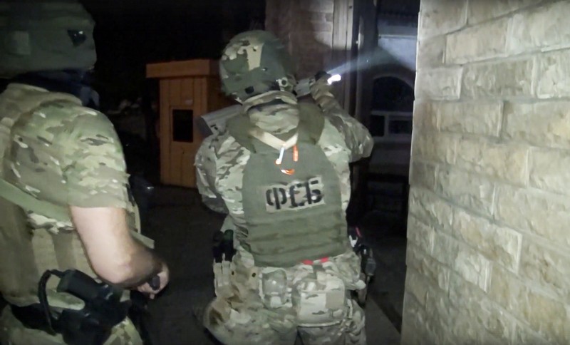 A view shows a shooting scene on the street of Makhachkala, Dagestan, in southern Russia, June 23, 2024, in this still image obtained from a video.  VIDEO OBTAINED BY REUTERS/via REUTERS  THIS IMAGE HAS BEEN SUPPLIED BY A THIRD PARTY. MANDATORY CREDIT. NO RESALES. NO ARCHIVES.